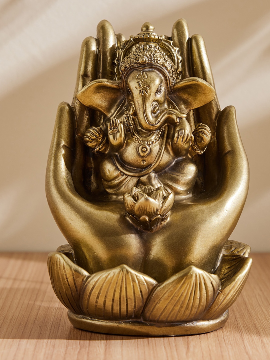

Home Centre Gold-Toned Textured Ganesh Showpieces