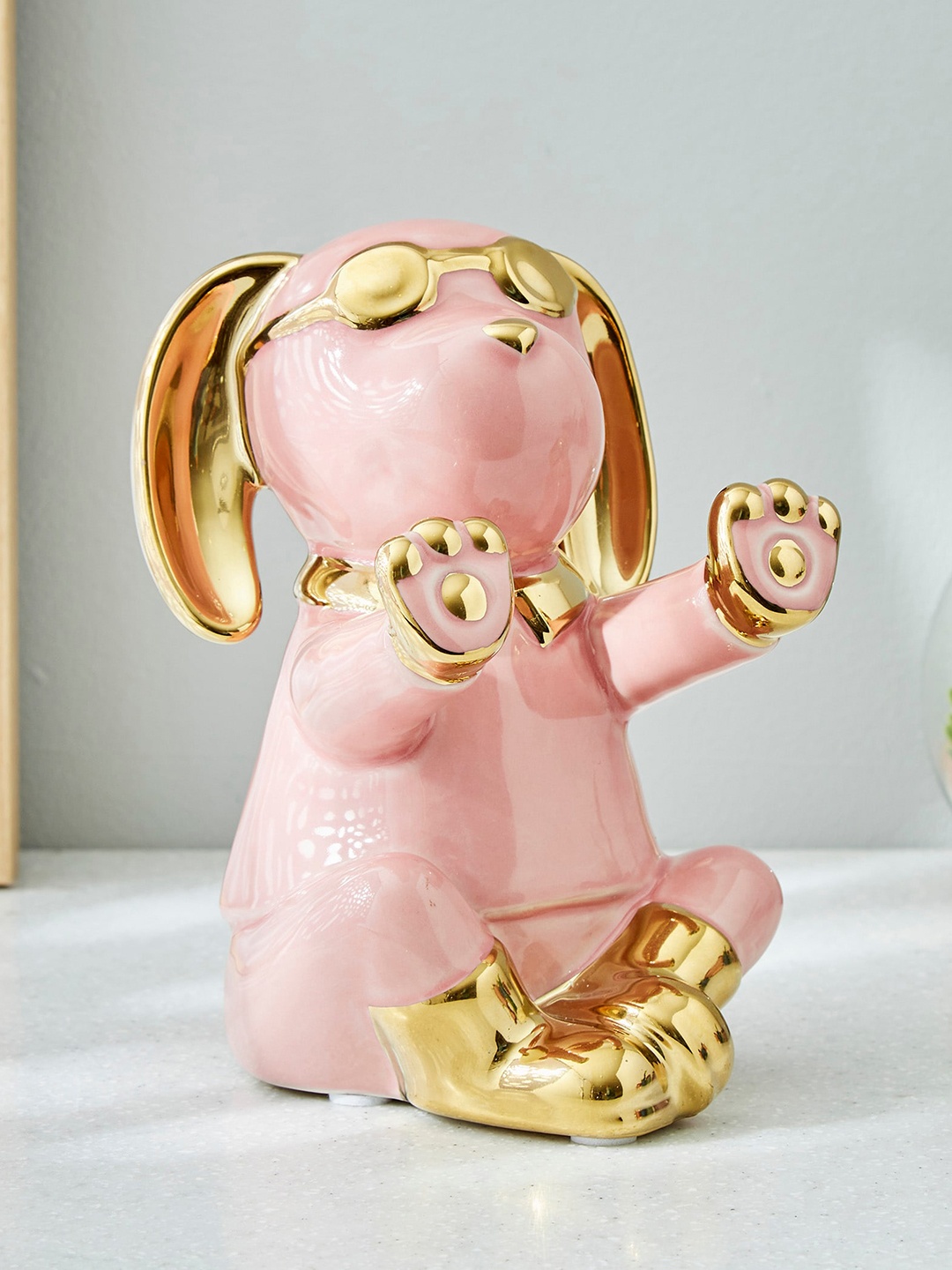 

Home Centre Pink & Golden Decorative Dog Figurine Showpiece