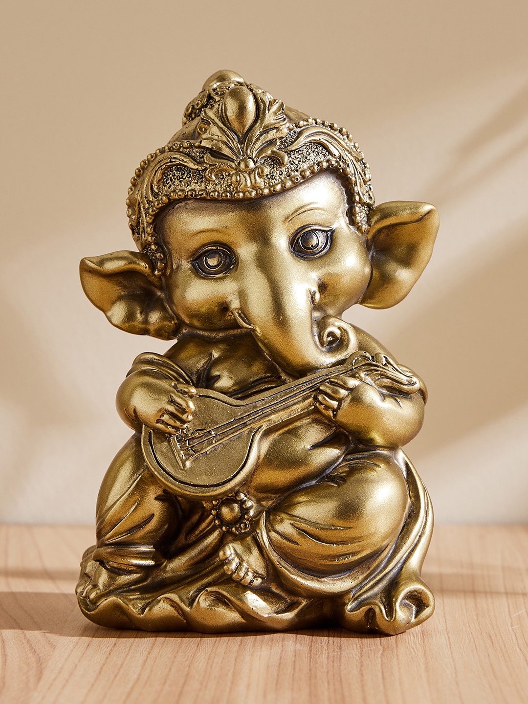 

Home Centre Golden Tranquil Gifts Sitar Ganesha Figurine Showpiece, Gold