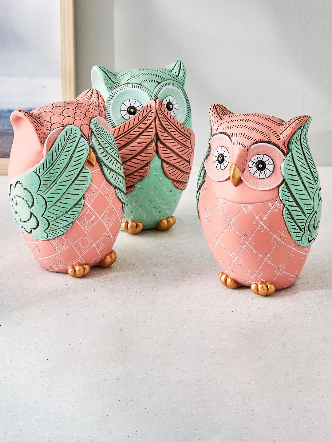 

Home Centre Teal Blue Owl Table Accent Showpieces