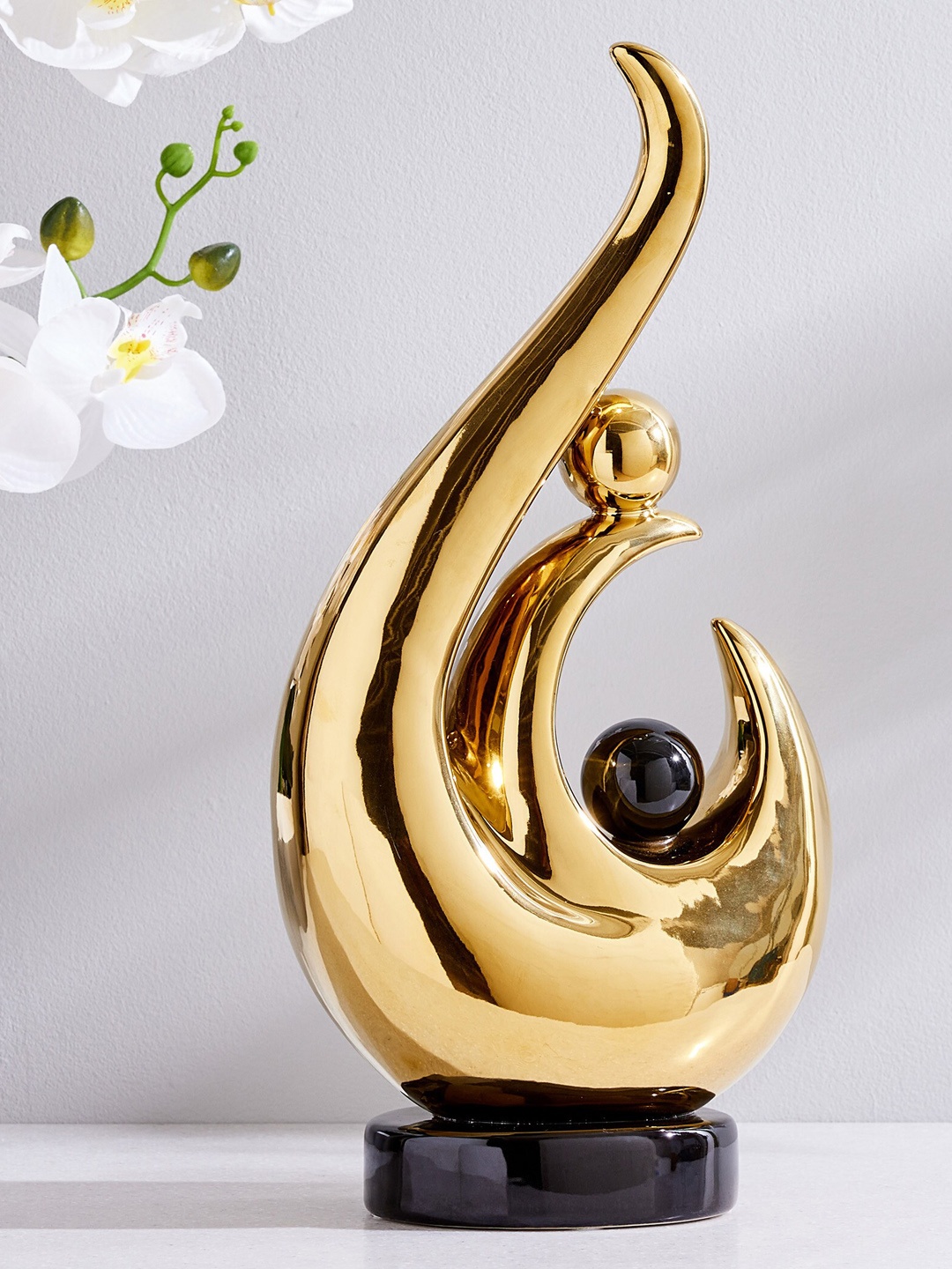 

Home Centre Golden Rivoli Ceramic Abstract Table Accent Showpiece, Gold