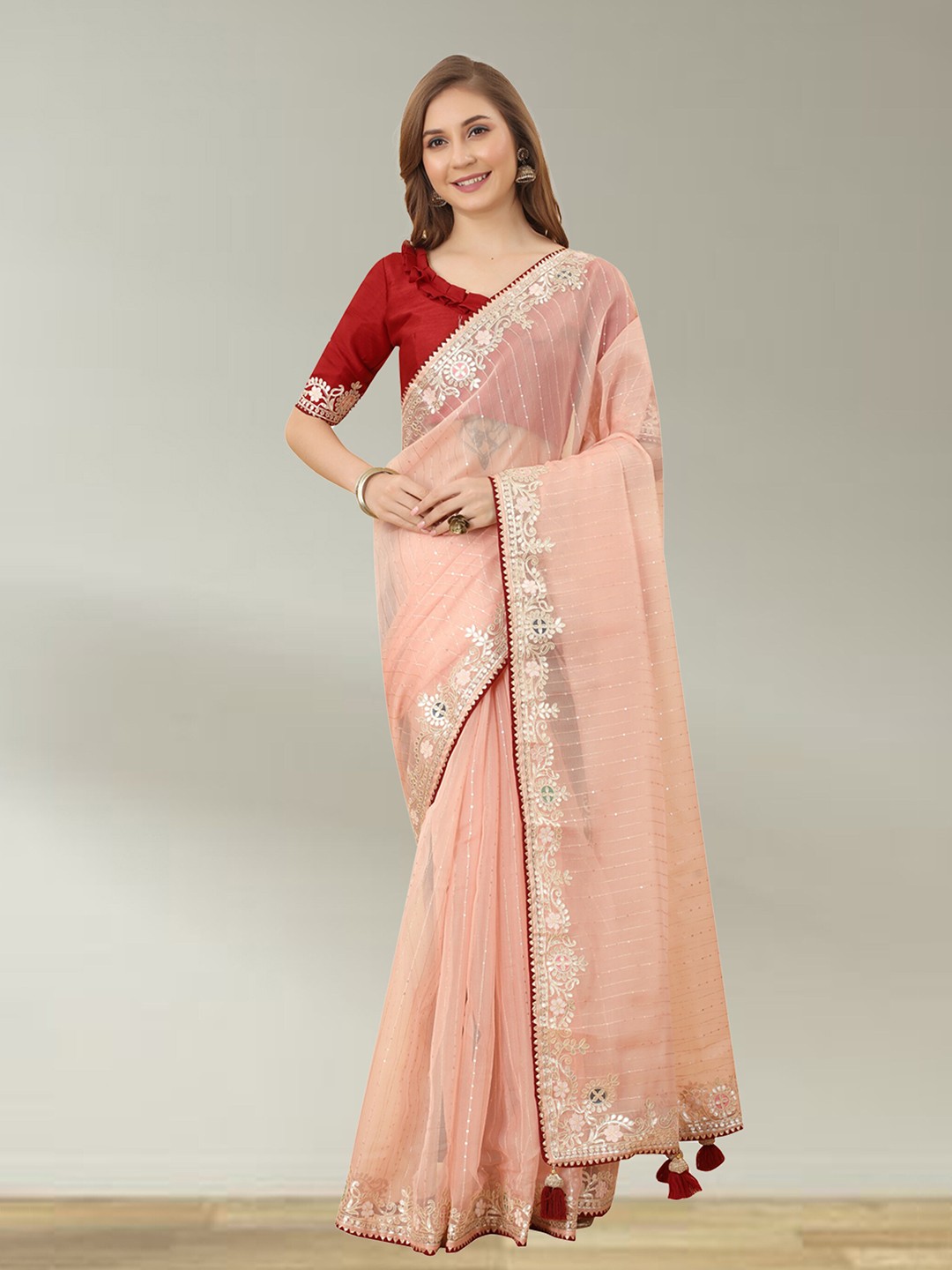 

N N ENTERPRISE Striped Embellished Embroidered Net Saree, Peach