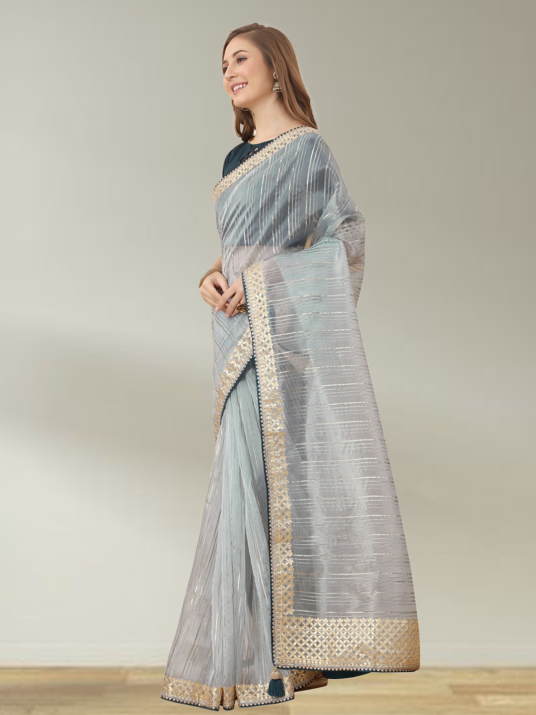 

N N ENTERPRISE Striped Embroidered Net Saree, Grey