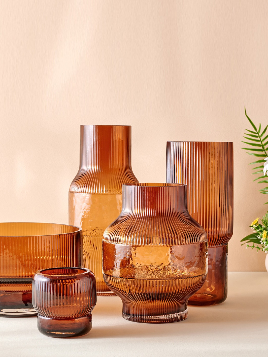

Home Centre Brown Glass Tea Light Candle Holder