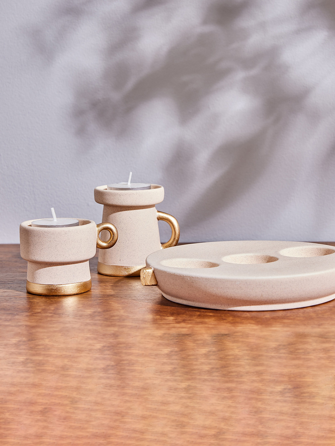 

Home Centre Beige T Light Holders