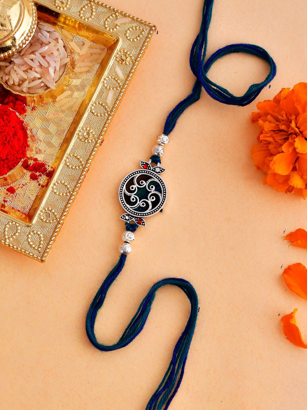 

Voylla Beaded Mandala Inspired Thread Rakhi, Blue