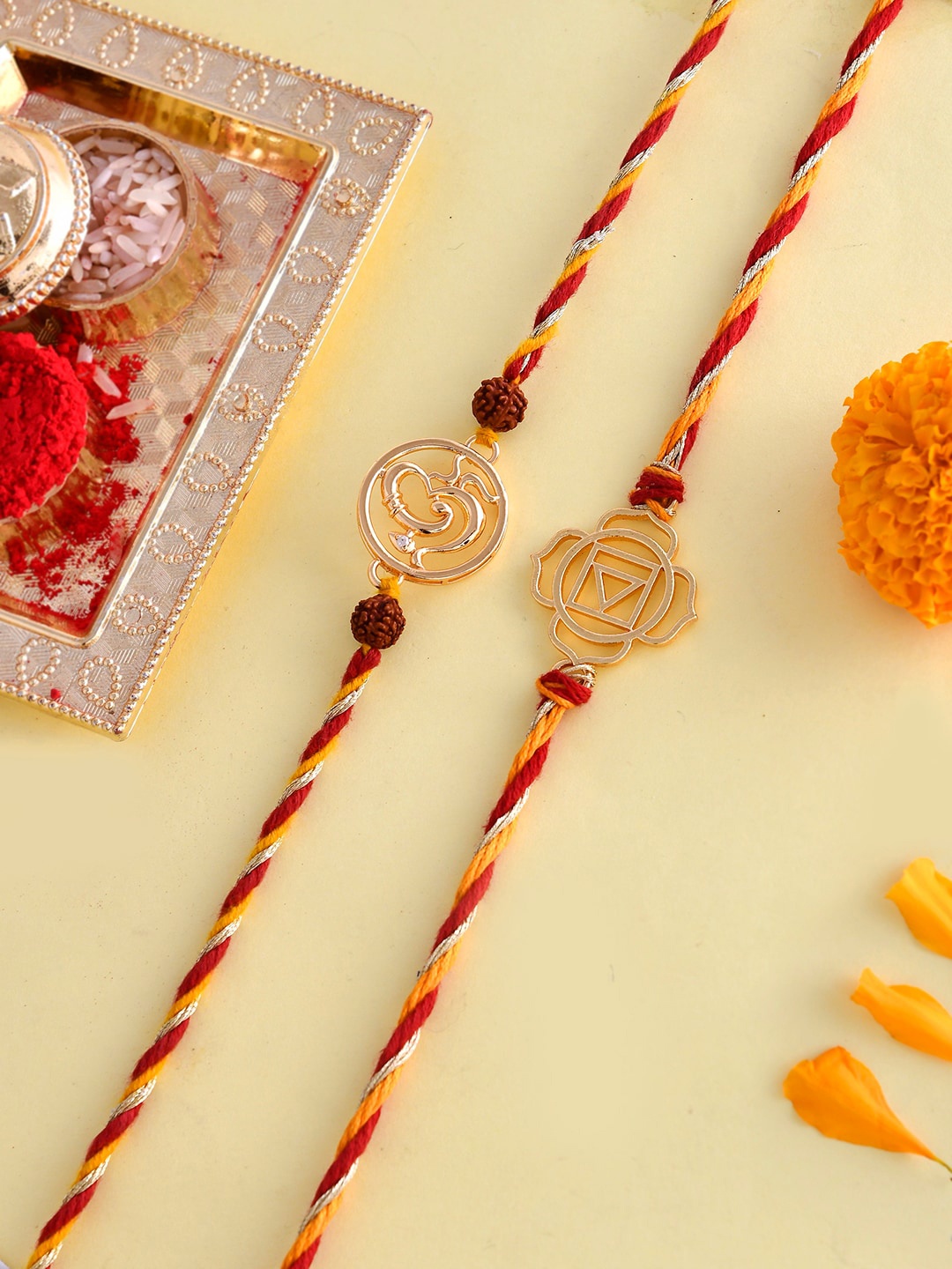 

Voylla Pack Of 2 Om And Abstract Ethnic Motifs Thread Rakhi, Gold