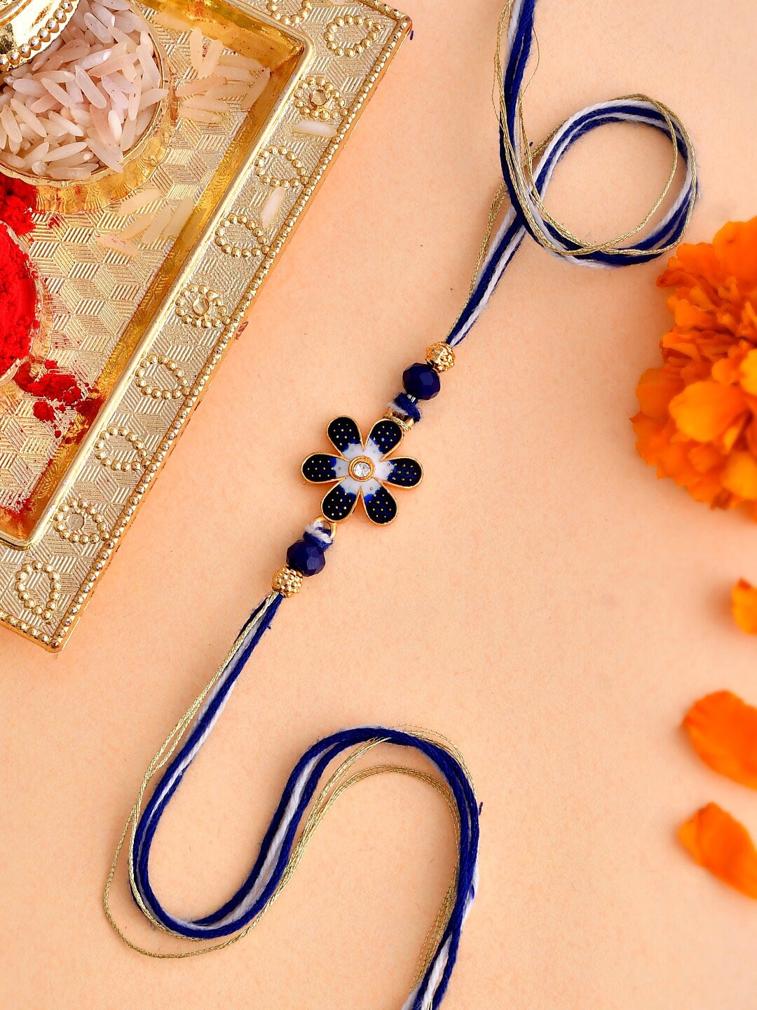 

Voylla Ethnic Floral Motif Blue Thread Rakhi