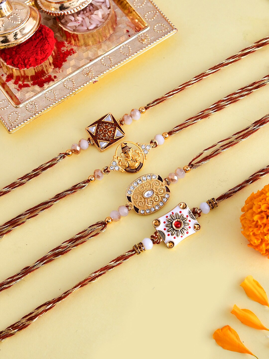

Voylla Set Of 4 Cutwork Gemstones Beaded Thread Rakhis, Brown