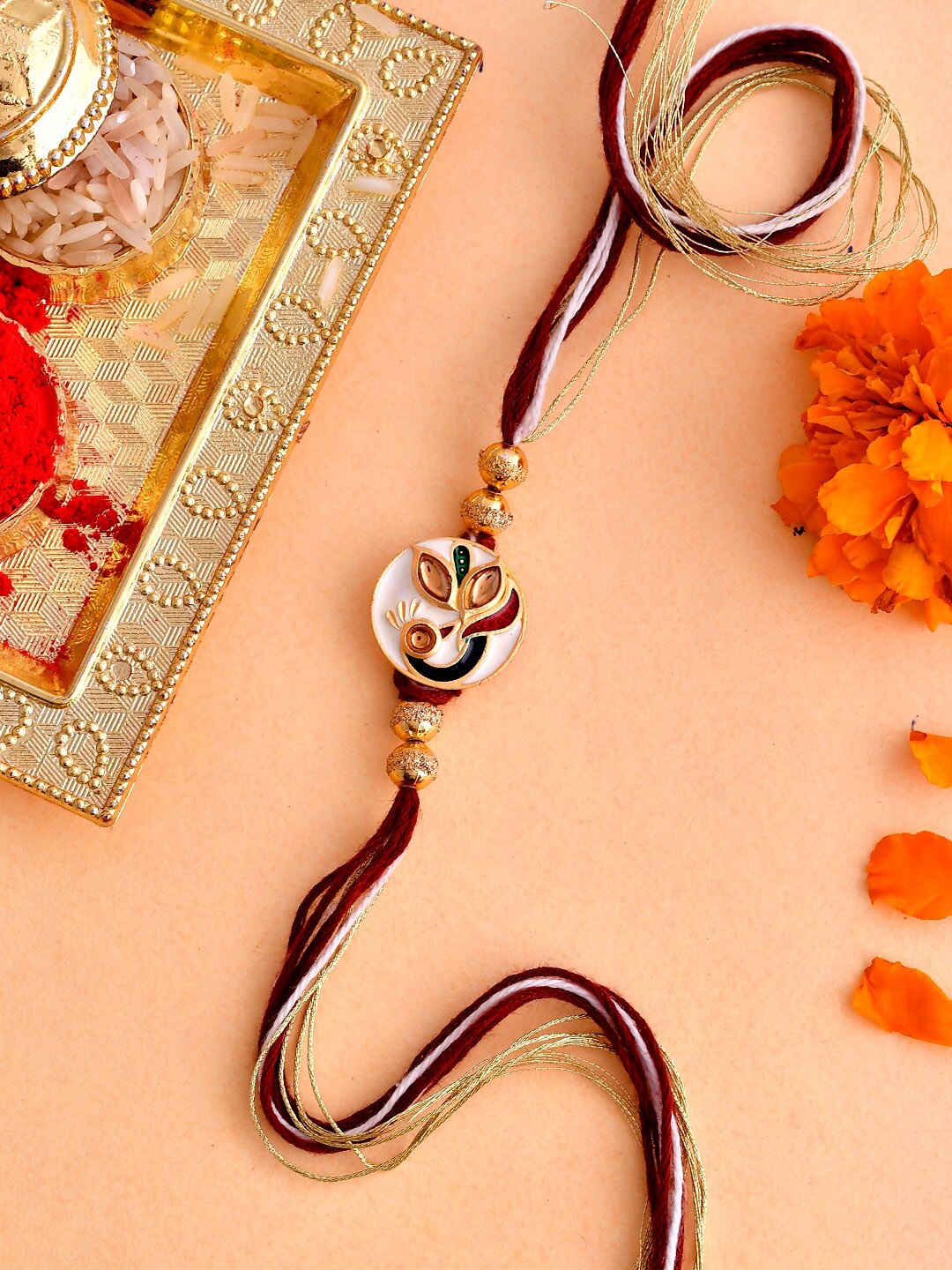 

Voylla Enameled Peacock Motif Thread Rakhi, Maroon