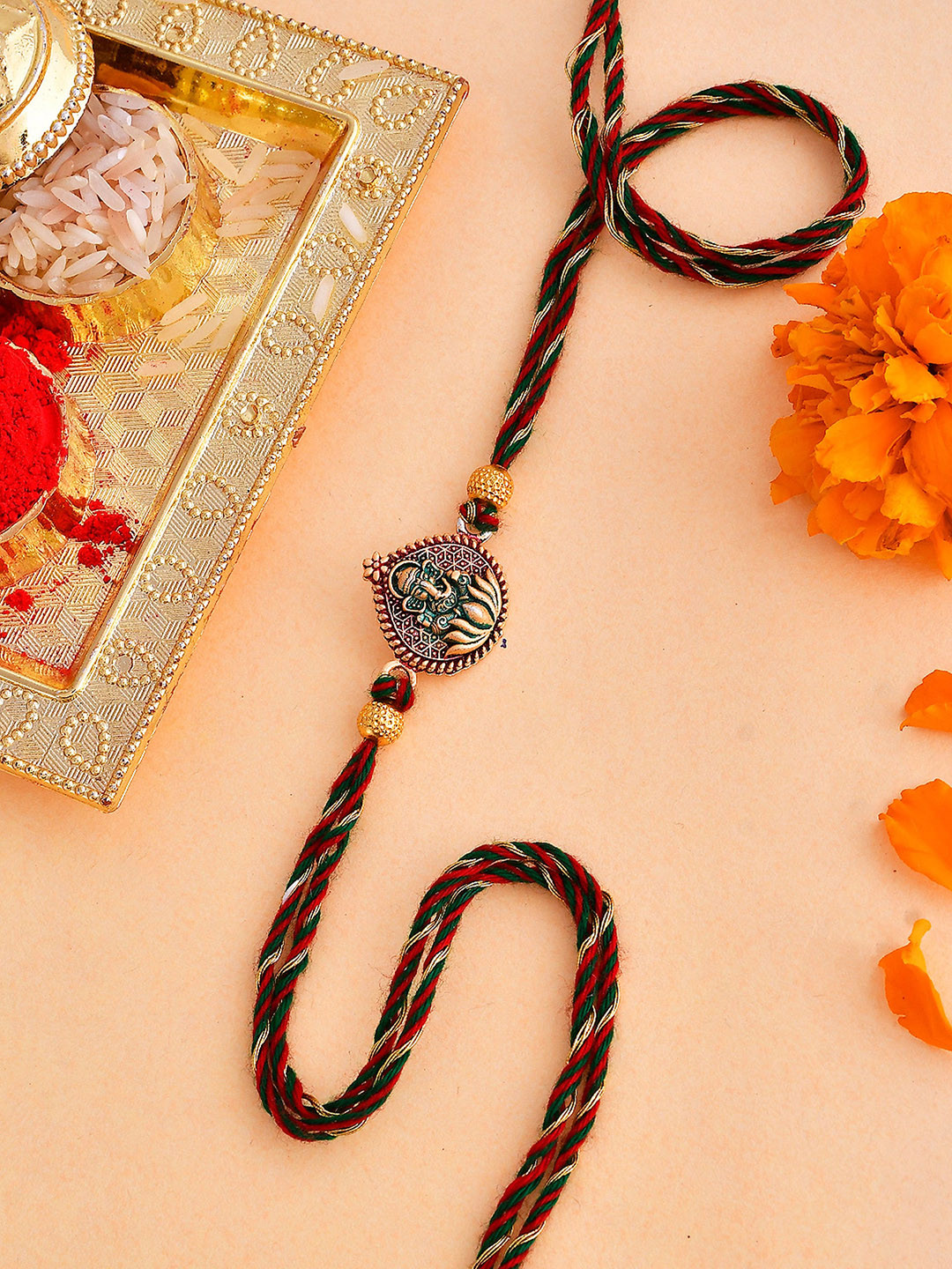 

Voylla Lord Ganesha Colorful Enameled Ethnic Rakhi, Red