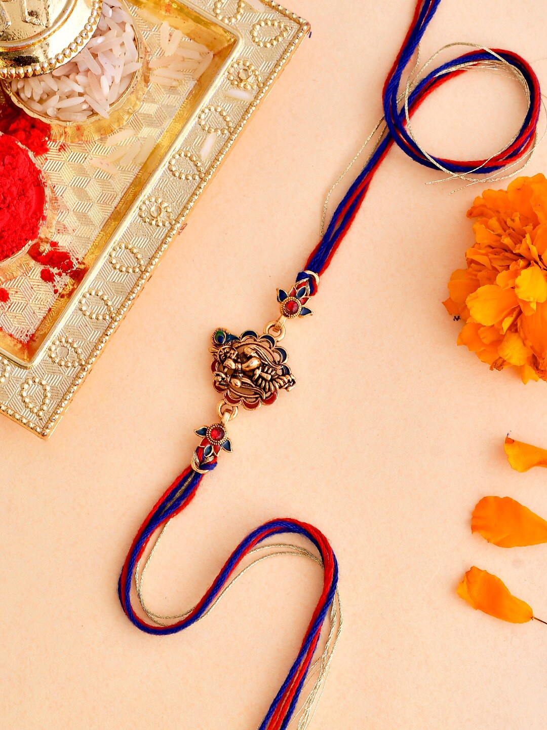 

Voylla Traditional Lord Krishna Motif Thread Rakhi, Red