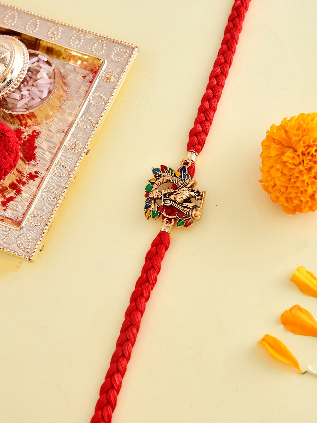 

Voylla Colorful Radha Krishna Thread Rakhi, Red