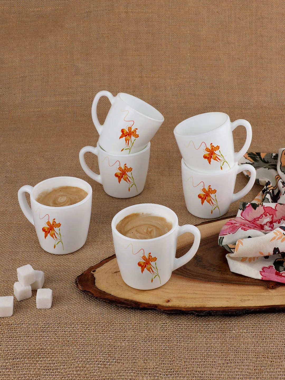 

Cello White & Orange Floral Printed Ceramic Glossy Cups Set of Cups and Mugs