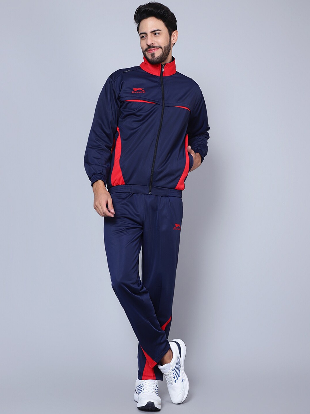 

Shiv Naresh Men Colourblocked Brand Logo Printed Tracksuits, Navy blue