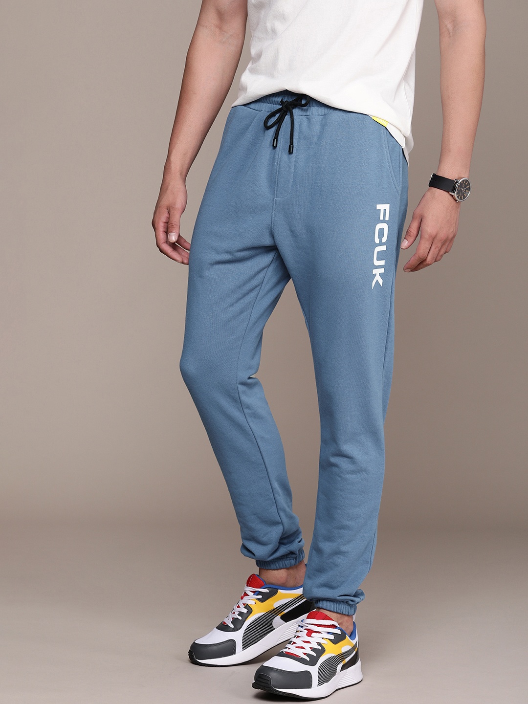 

FCUK Men Brand Logo Printed Mid-Rise Regular Joggers, Blue