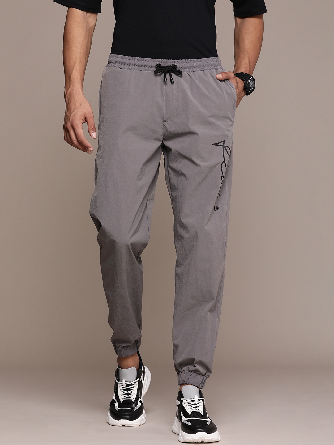 

FCUK Men Mid-Rise Printed Joggers, Grey