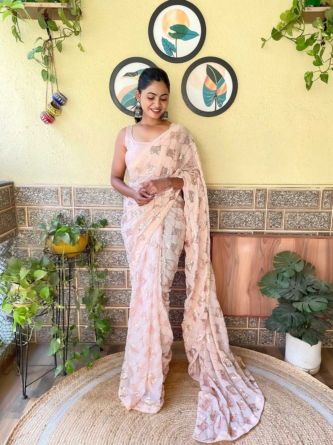 

Mitera Peach-Coloured Embellished Sequinned Saree