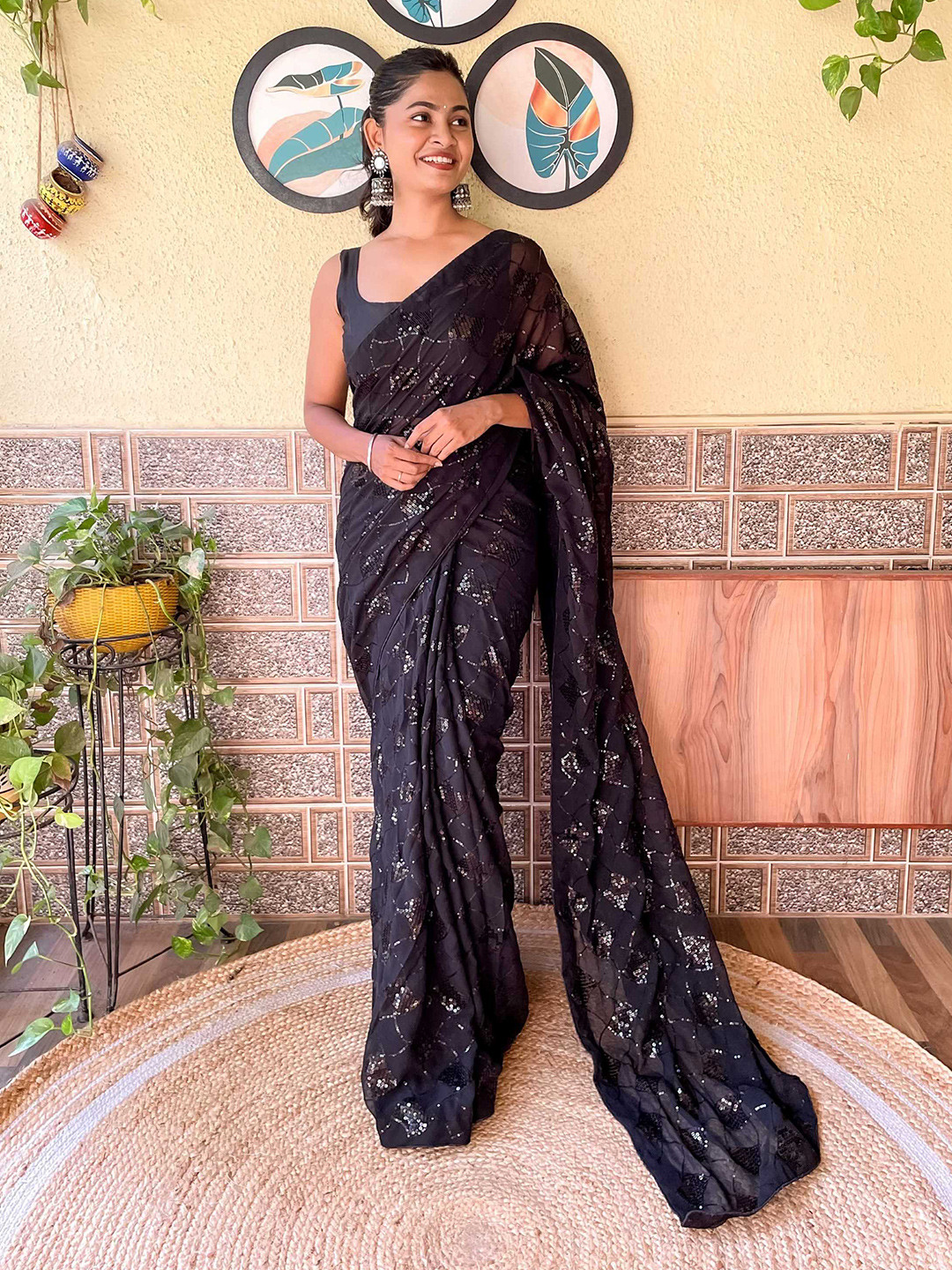 

Mitera Black Embellished Sequinned Poly Georgette Saree