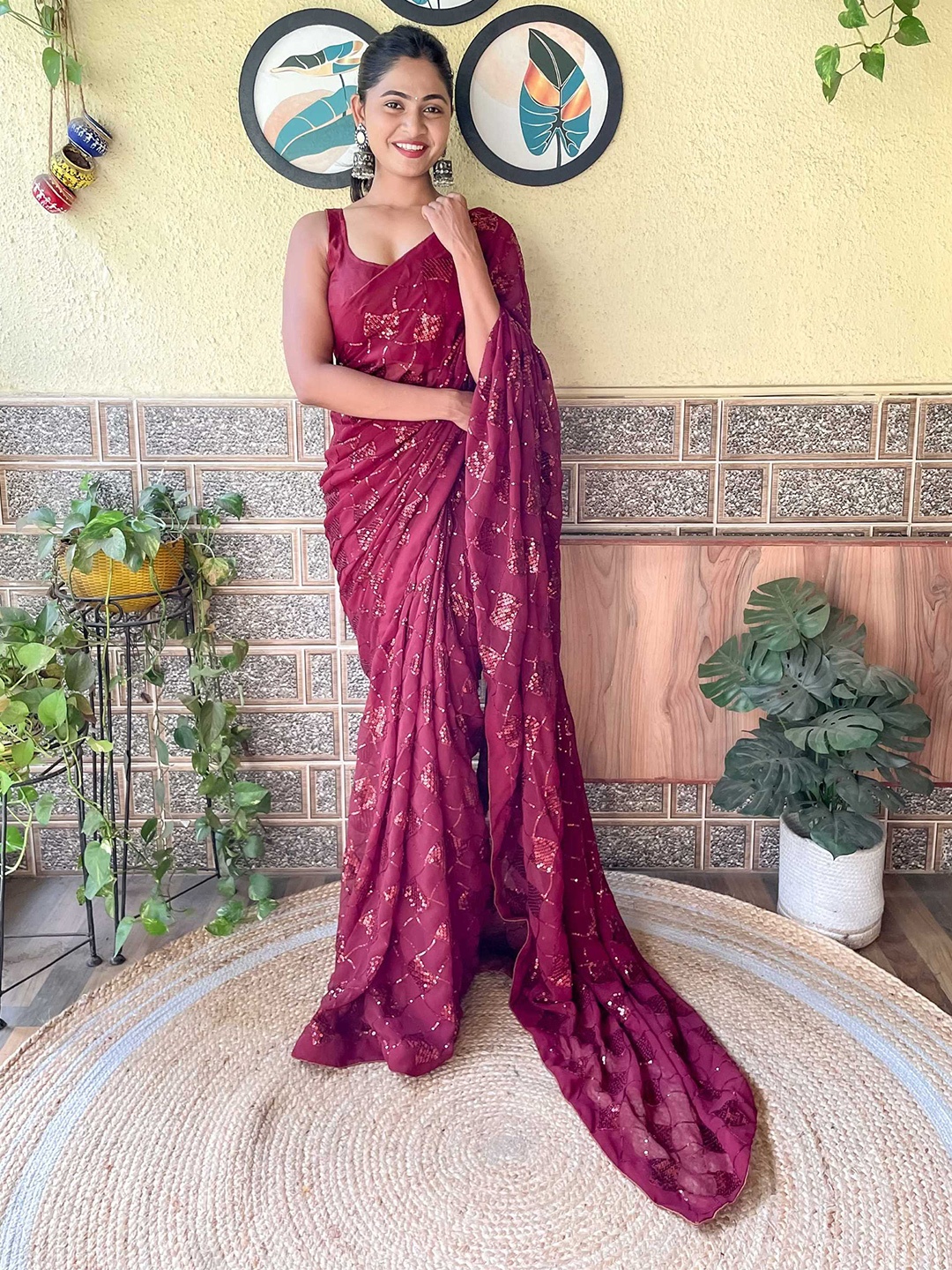 

Mitera Maroon Embellished Sequinned Poly Georgette Saree