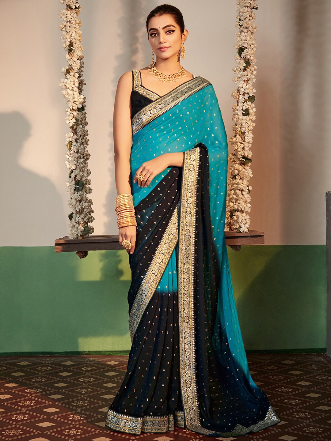 

Anouk Blue & Black Ethnic Motifs Embroidered Pure Georgette Saree
