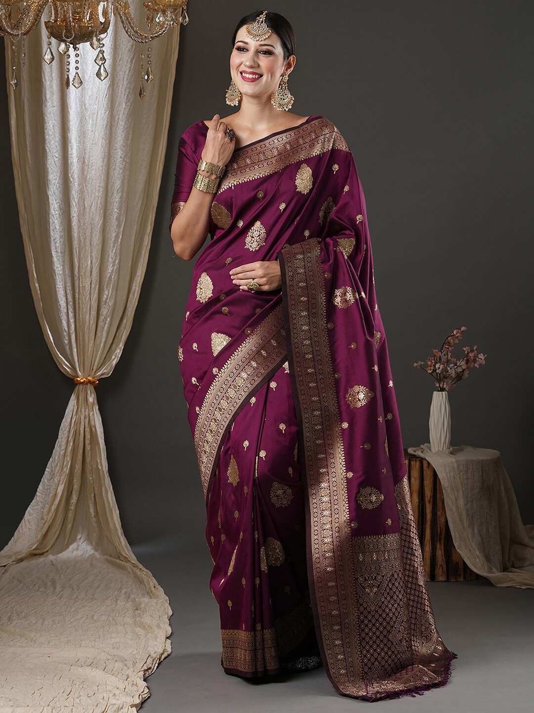 

Anouk Purple & Gold-Toned Ethnic Motifs Zari Banarasi Saree