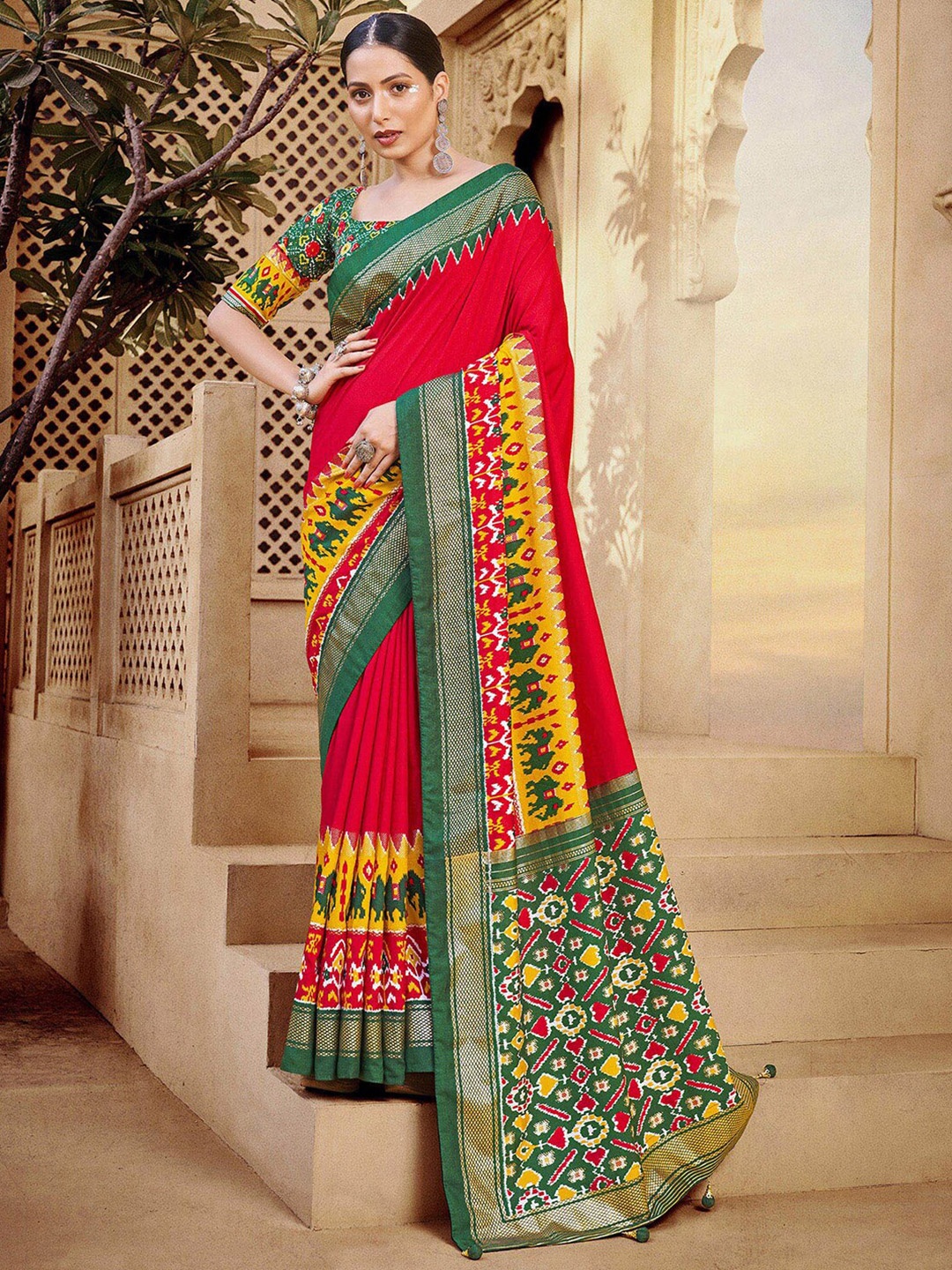 

Anouk Red & Green Ethnic Motifs Printed Zari Patola Saree