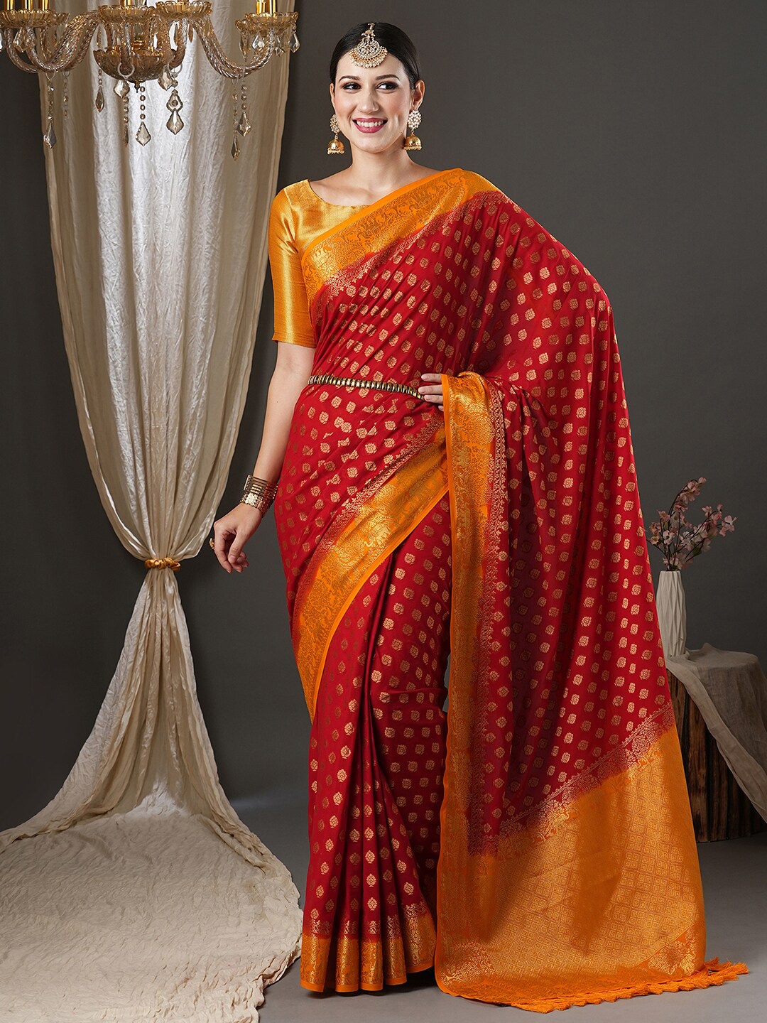

Anouk Red & Orange Ethnic Motifs Woven Design Zari Pure Georgette Kanjeevaram Saree
