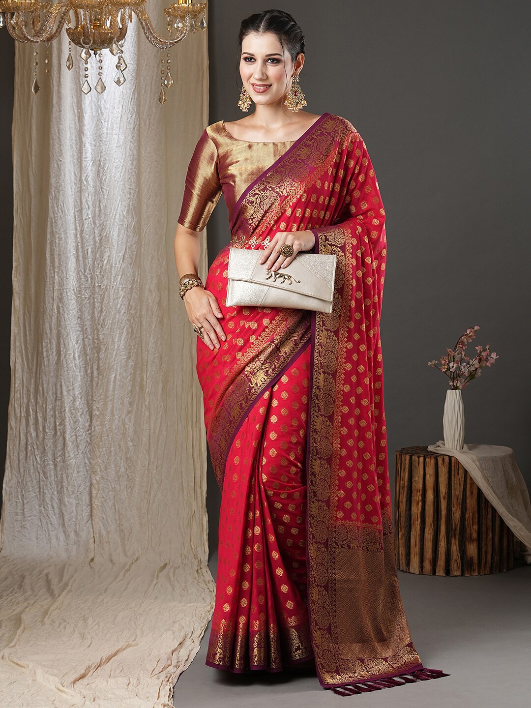 

Anouk Pink & Gold-Toned Ethnic Motif Woven Design Zari Pure Georgette Kanjeevaram Saree