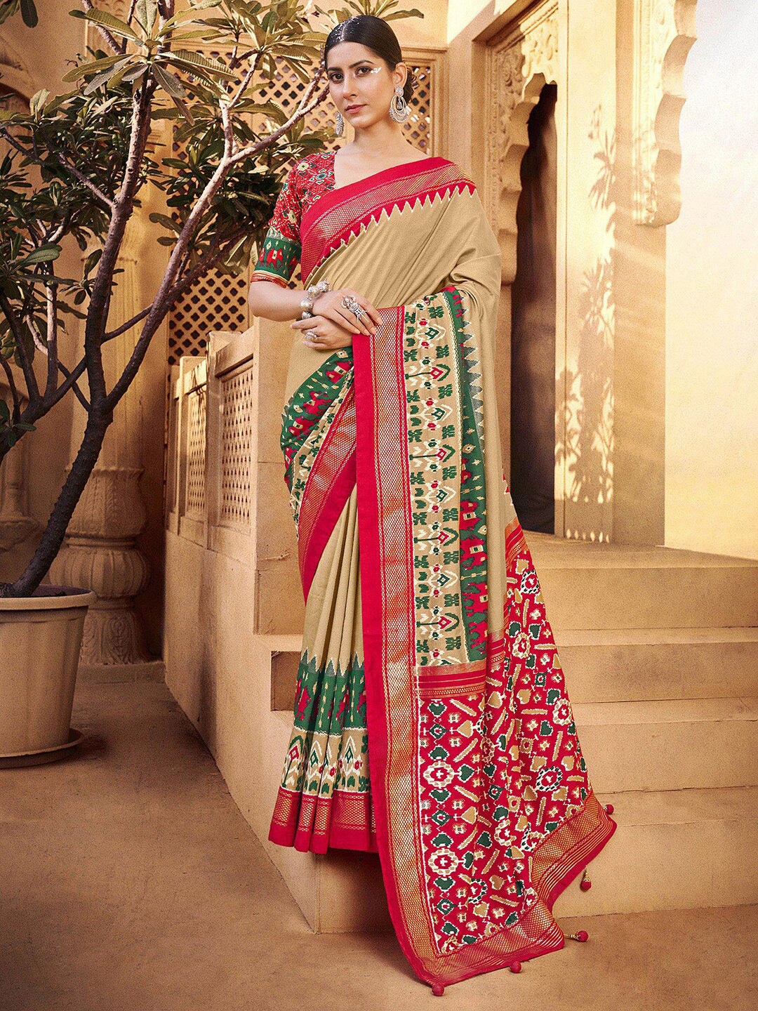 

Anouk Cream-Coloured & Red Ethnic Motifs Zari Patola Saree