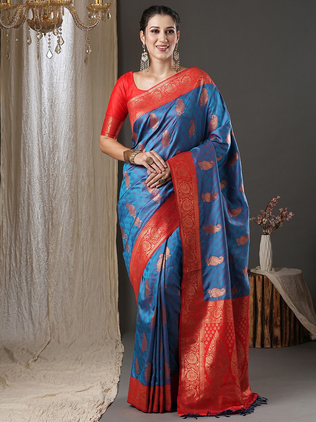 

Anouk Blue & Red Ethnic Motif Woven Design Zari Banarasi Saree