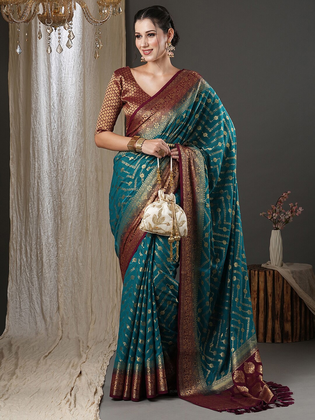 

Anouk Blue & Brown Ethnic Motifs Woven Design Zari Pure Georgette Kanjeevaram Saree