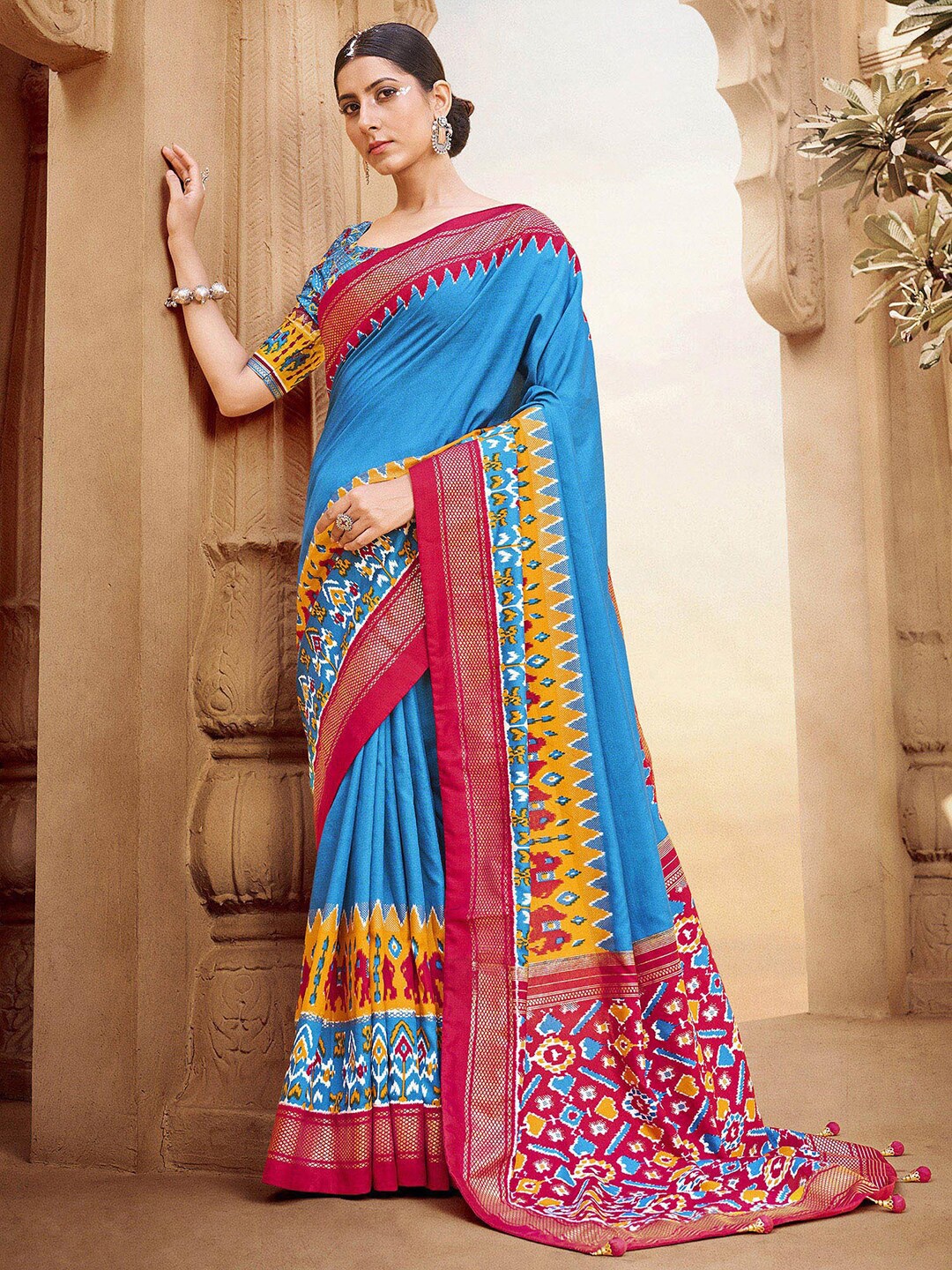 

Anouk Blue & Red Ethnic Motifs Printed Zari Silk Blend Patola Saree