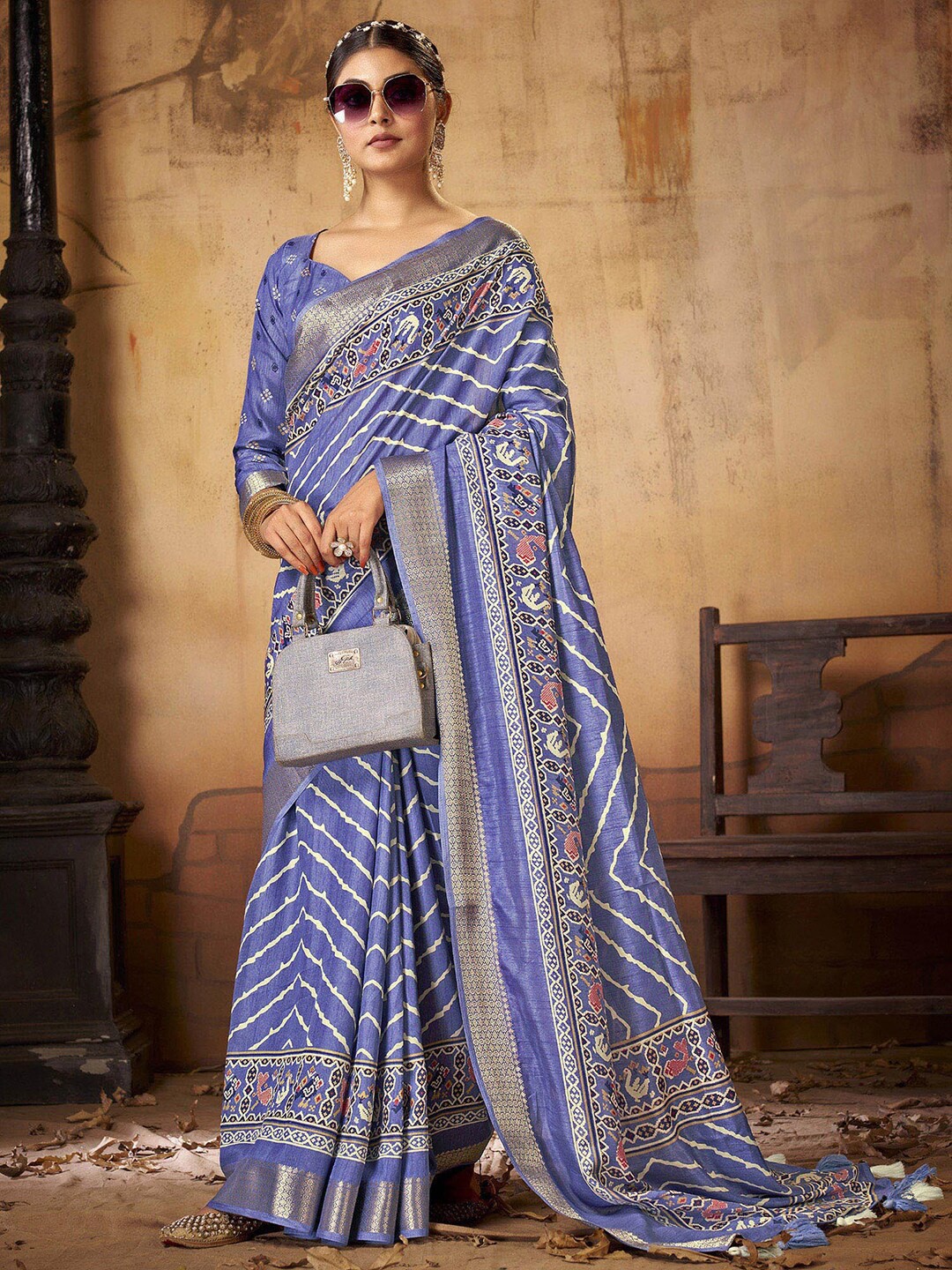 

Anouk Blue & Gold-Toned Striped Zari Patola Saree