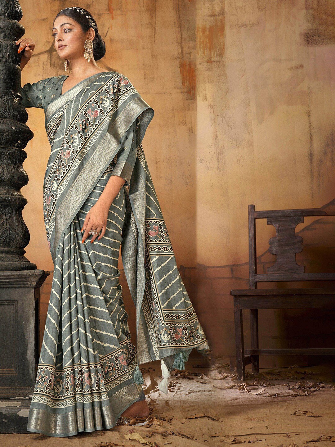 

Anouk Grey & Cream-Coloured Ethnic Motifs Zari Patola Saree