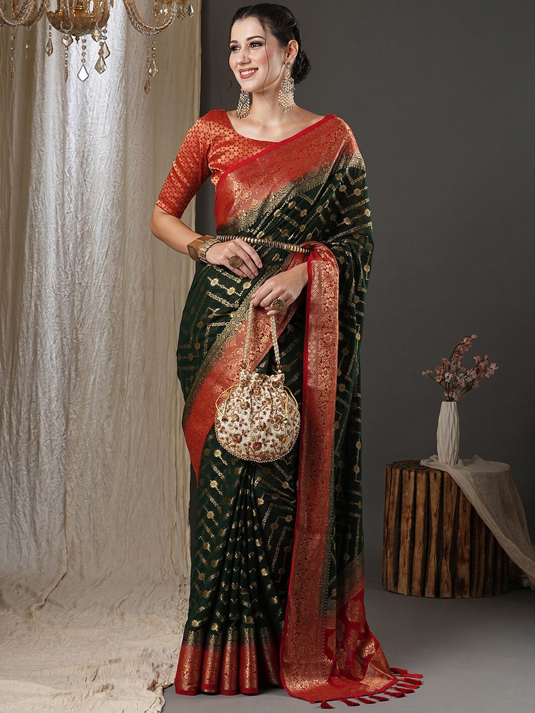 

Anouk Green & Red Woven Design Zari Pure Georgette Kanjeevaram Saree