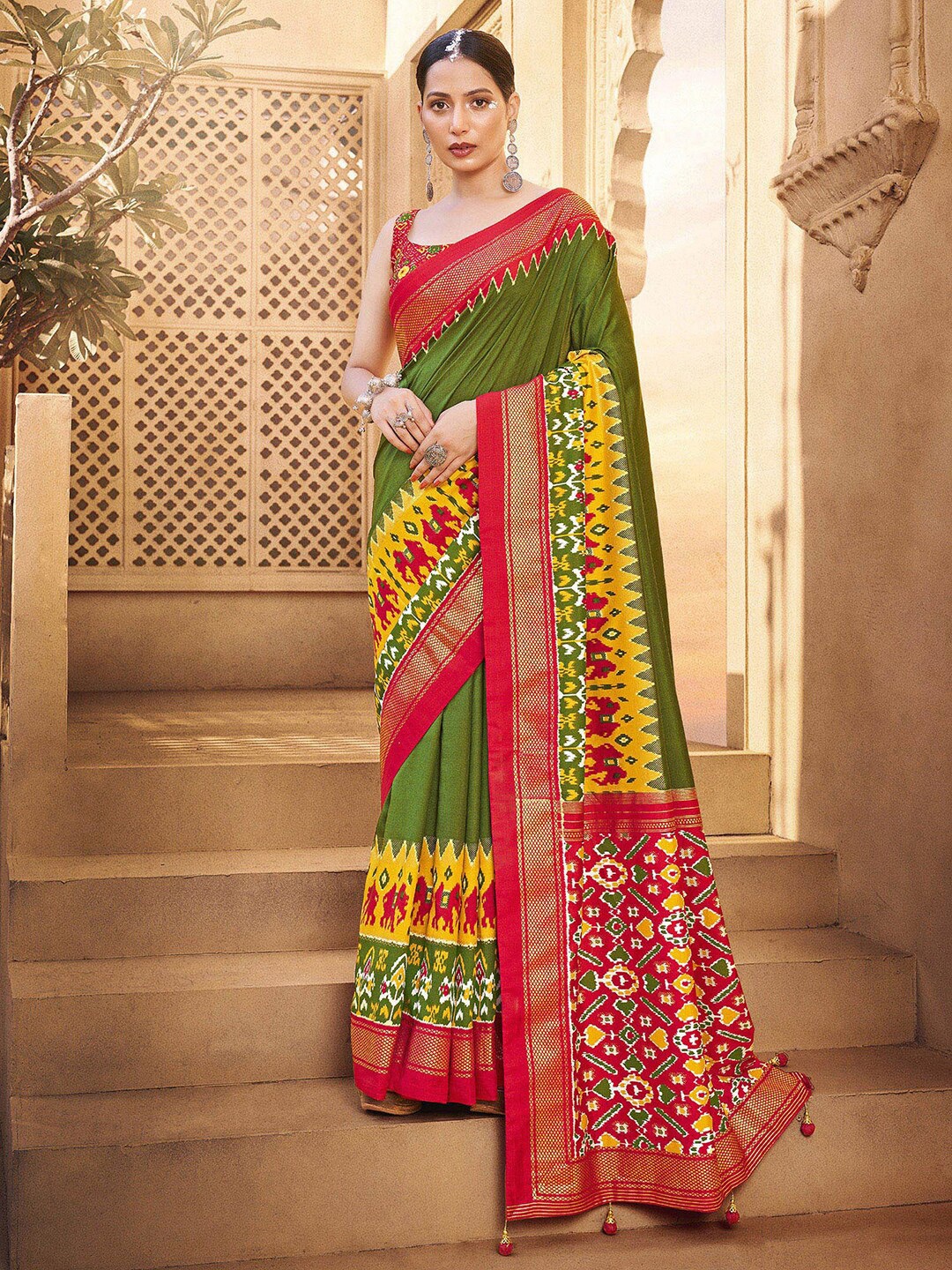 

Anouk Olive Green & Red Ethnic Motifs Printed Zari Patola Saree