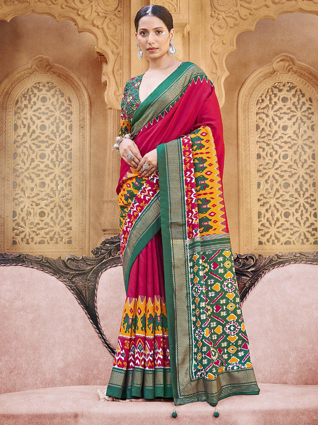 

Anouk Pink & Green Ethnic Motifs Printed Zari Ikat Saree