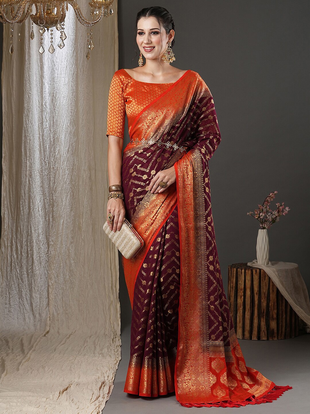 

Anouk Purple & Orange Woven Design Zari Pure Georgette Kanjeevaram Saree