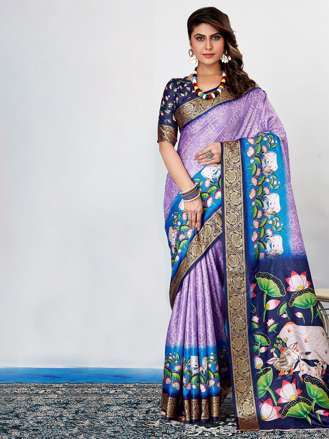 

Anouk Lavender & Navy Blue Zari Bandhani Saree