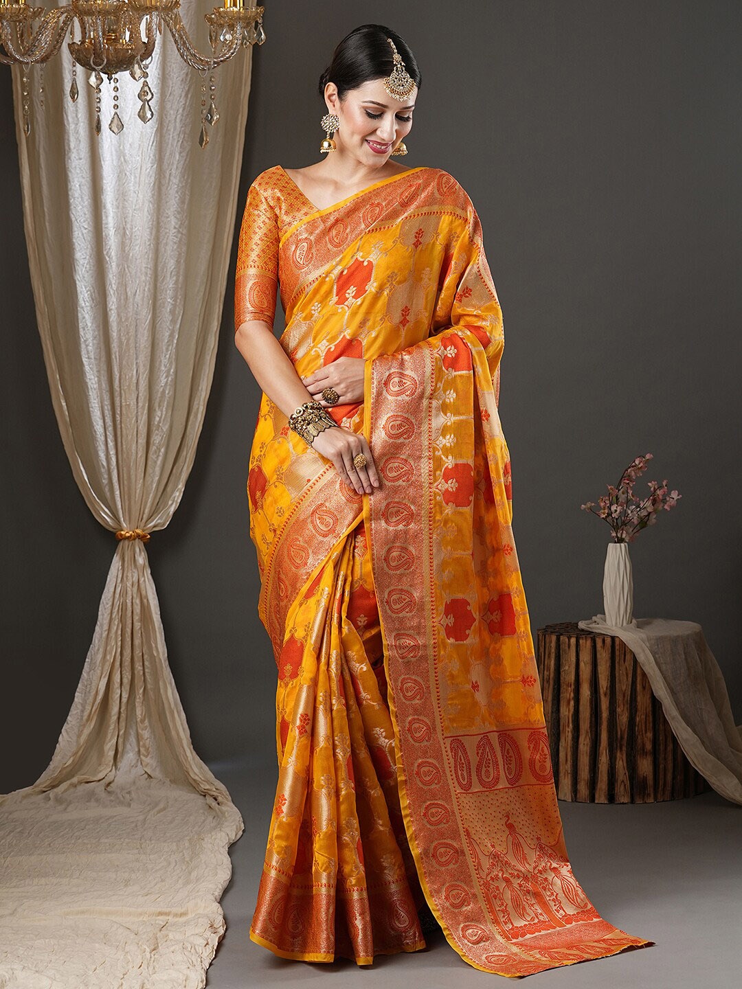 

Saree mall Yellow & Red Ethnic Motif Woven Design Zari Organza Banarasi Sarees