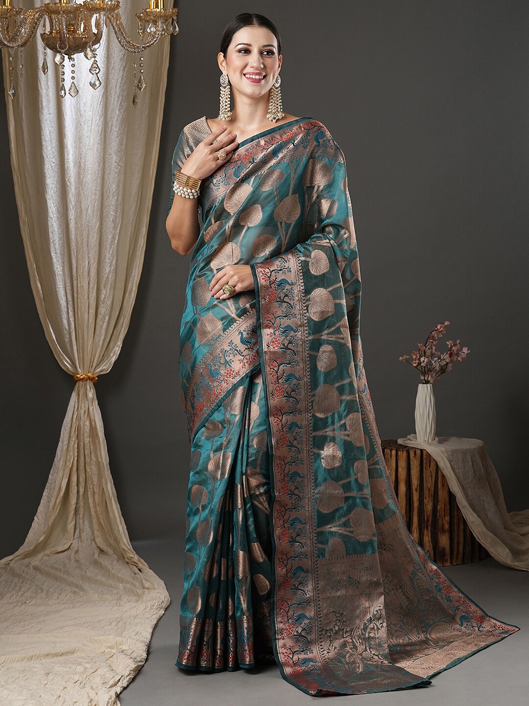 

Saree mall Teal & Gold-Toned Ethnic Motif Woven Design Zari Organza Banarasi Sarees