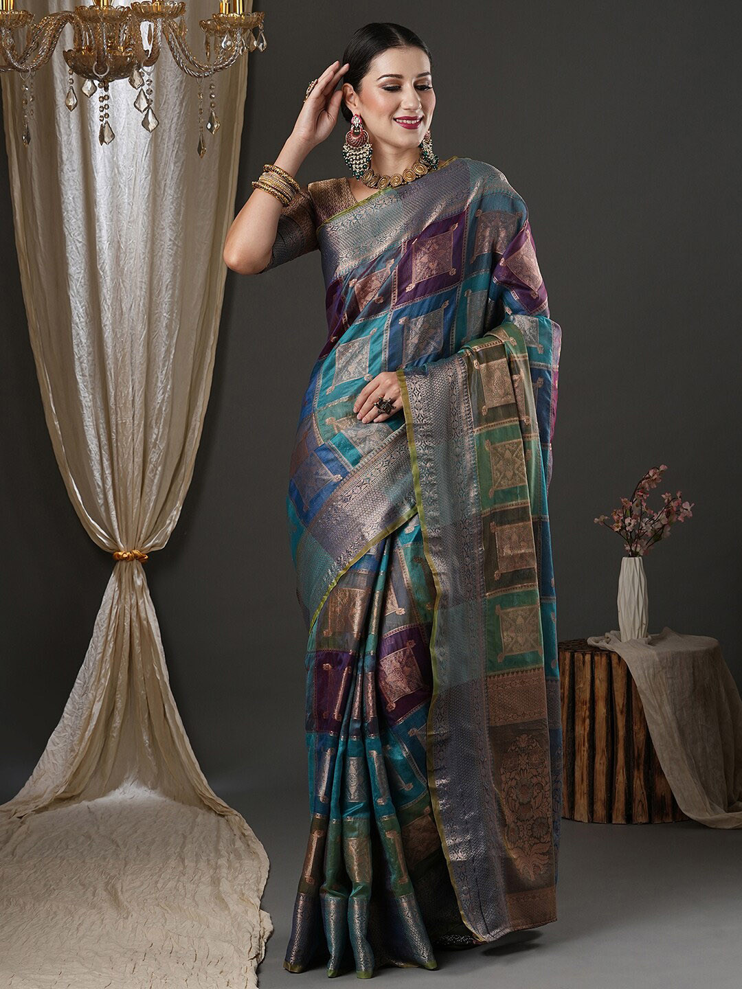 

Saree mall Blue & Purple Ethnic Motif Woven Design Zari Organza Banarasi Sarees
