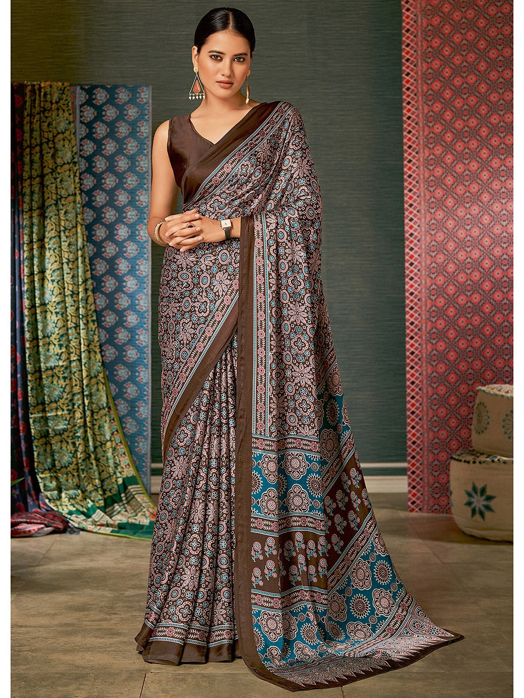 

Saree mall Brown & Teal Ajrak Poly Crepe Block Print Sarees