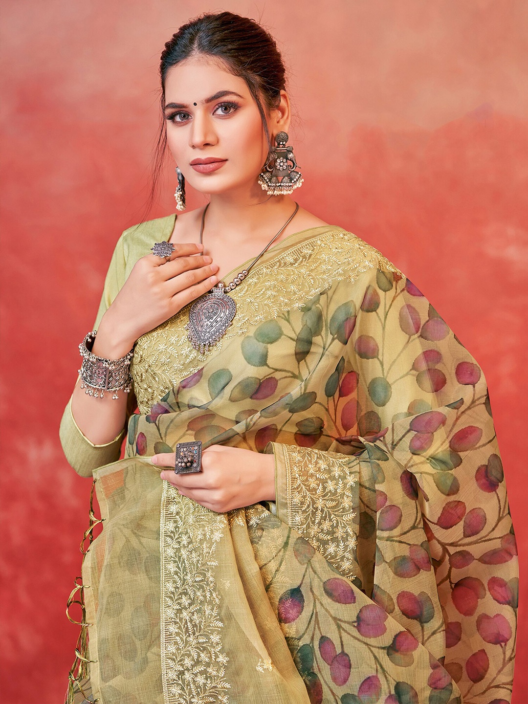 

Saree mall Green Floral Printed And Embroidered Organza Saree