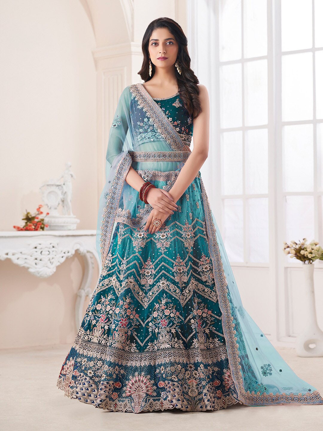 

Fusionic Embellished & Thread Worked Semi-Stitched Lehenga & Unstitched Blouse & Dupatta, Turquoise blue