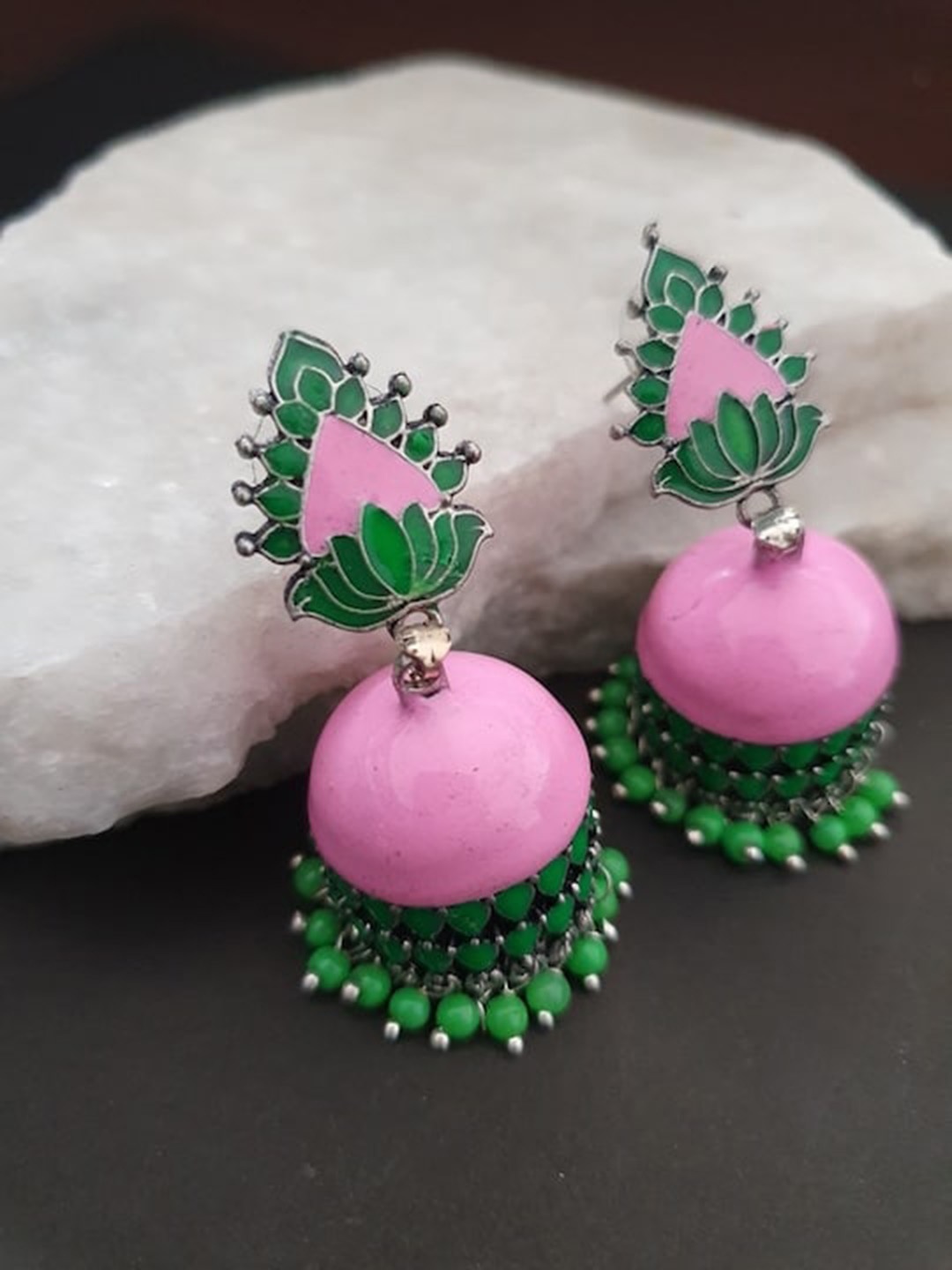

Infuzze Silver-Plated Contemporary Jhumkas Earrings