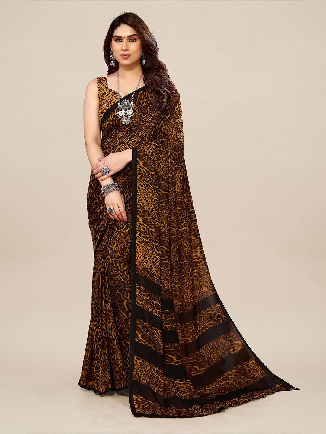 

Moda Rapido Animal Print Pure Georgette Saree With Blouse Piece, Yellow