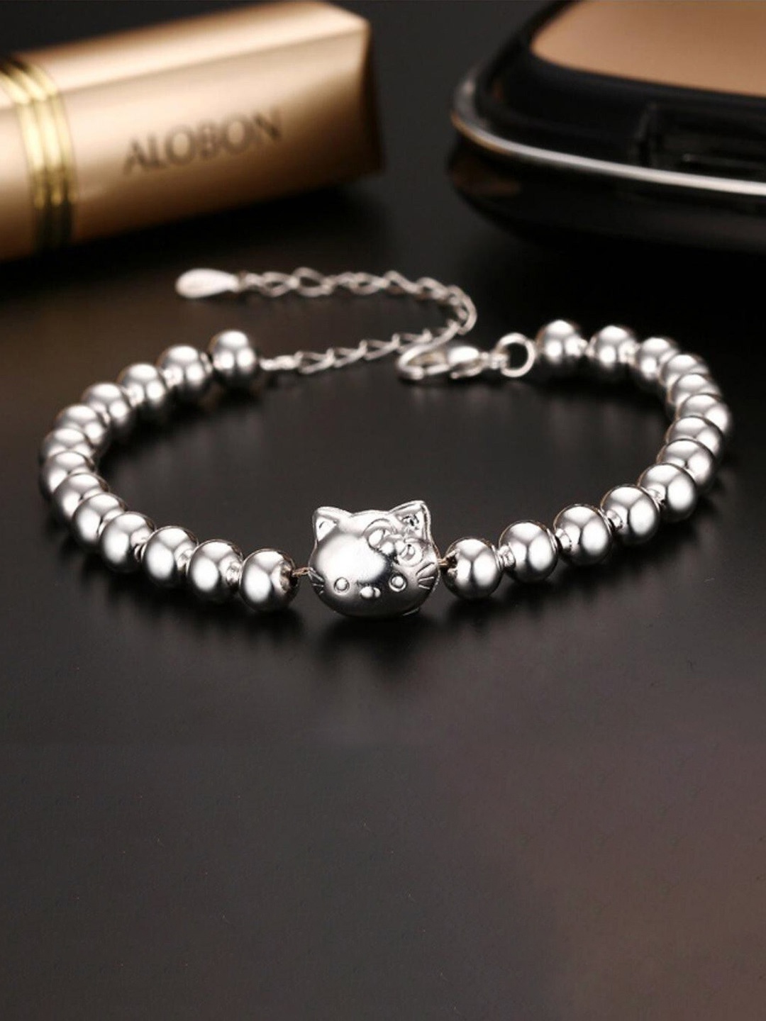 

MYKI Women Silver-Toned Cubic Zirconia Silver-Plated Link Bracelet