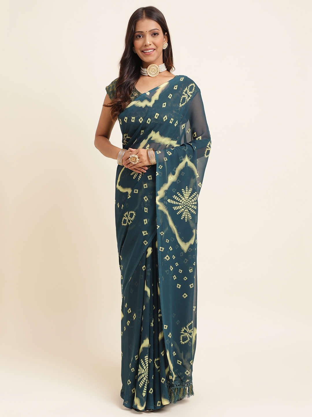 

Mitera Teal & Yellow Bandhani Printed Pure Georgette Saree